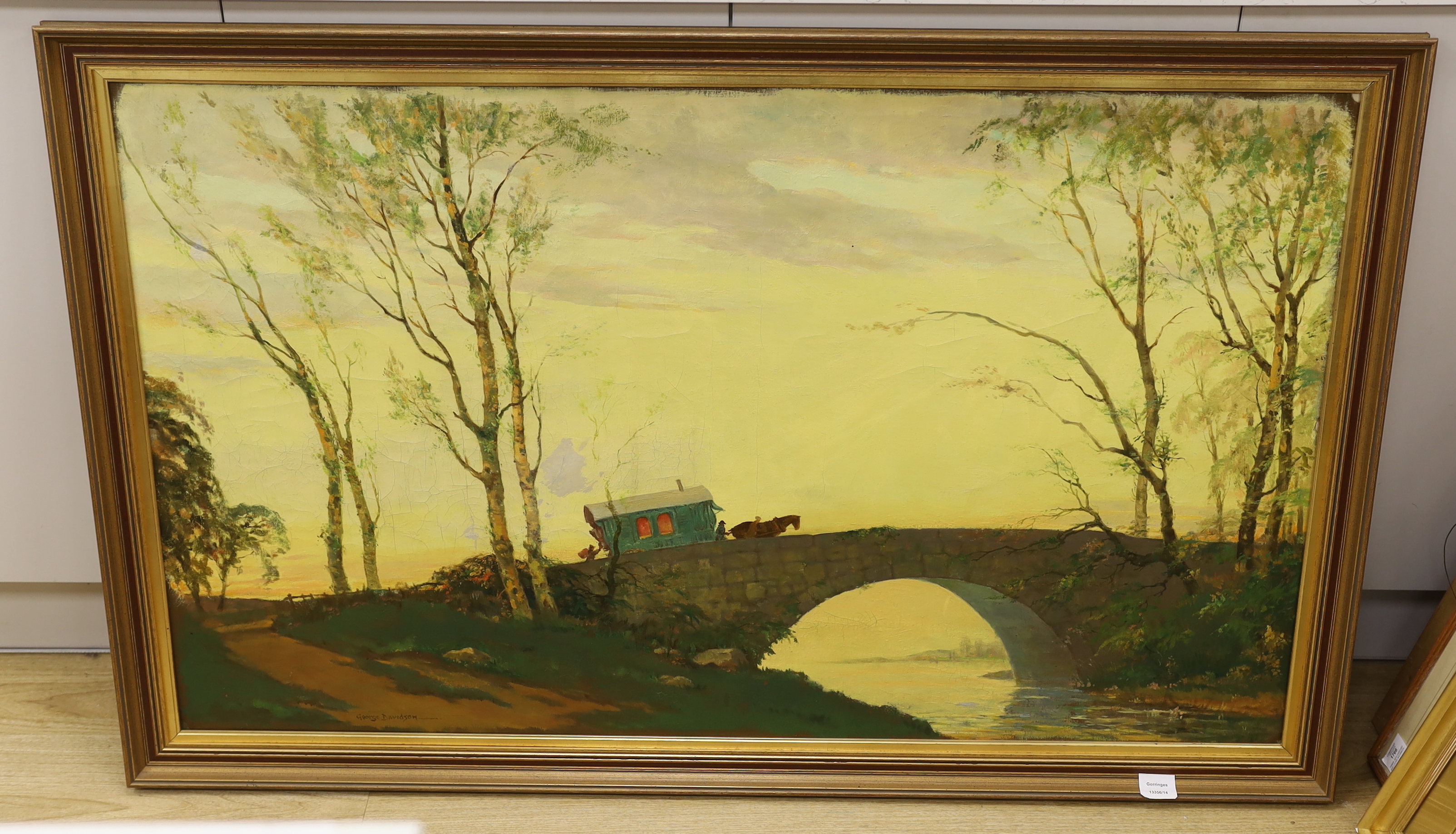 George Davidson (Polish/American, 1889-1965) naive oil on canvas, Gypsy wagon and figures crossing a bridge, signed, 74 x 124cm